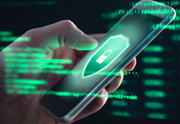 Phishing, cyber security, online information breach or identity theft crime concept. Hacked phone. Hacker and cellphone with hologram data. Mobile scam, fraud or crime. Cybersecurity infringement.