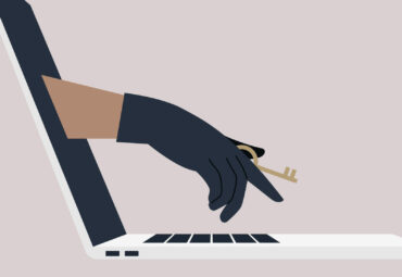 Sensitive information stealing, a hand in a black leather glove holding an access key, data breach concept