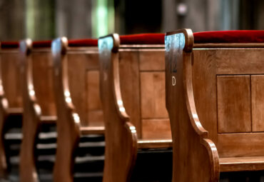 Wooden pews in a row in a church