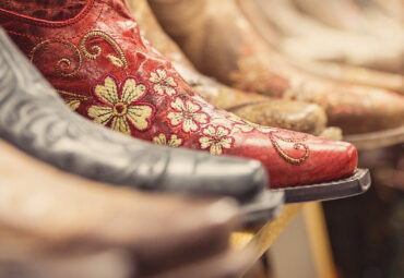 Cowboy boots in a store, vintage style western shoes